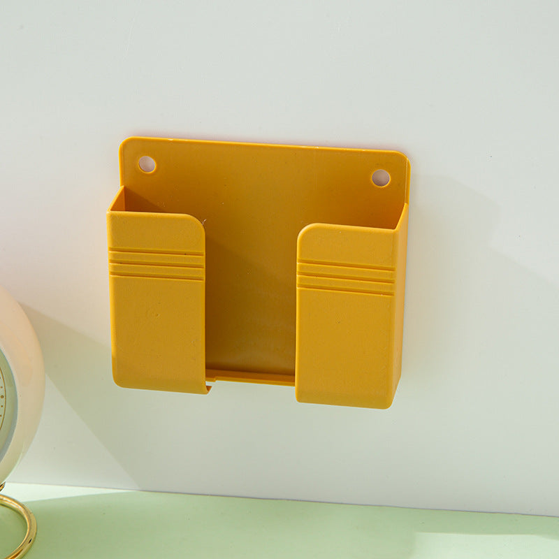 A wall-mounted mobile phone charging case storage rack