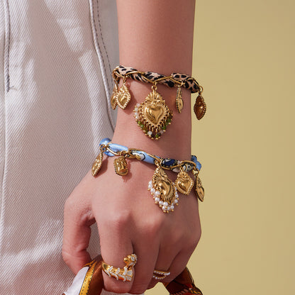 A pendant necklace bracelet jewelry