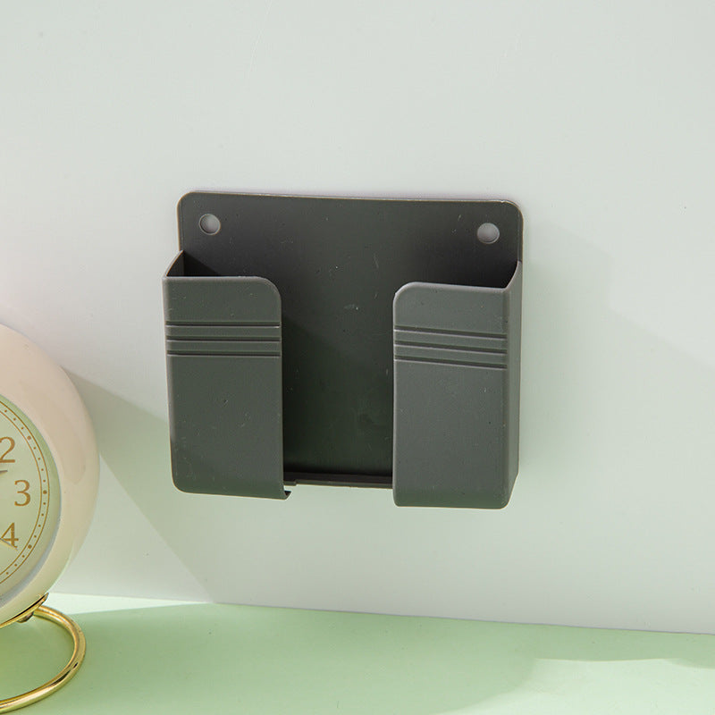 A wall-mounted mobile phone charging case storage rack