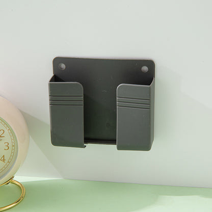 A wall-mounted mobile phone charging case storage rack