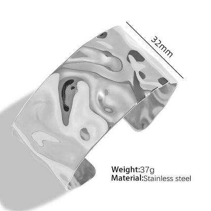 A European and American style titanium steel adjustable opening bracelet natural heavy industry beating pattern texture exaggerated personality design explosion