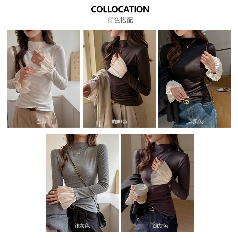 A top is worn inside the lace cuffs