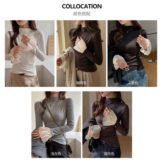 A top is worn inside the lace cuffs