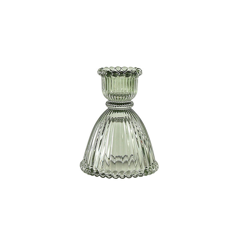 A glass candlestick ornament