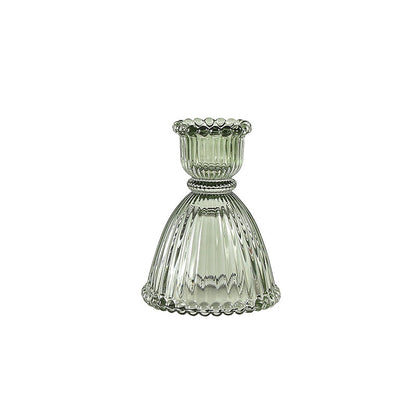 A glass candlestick ornament