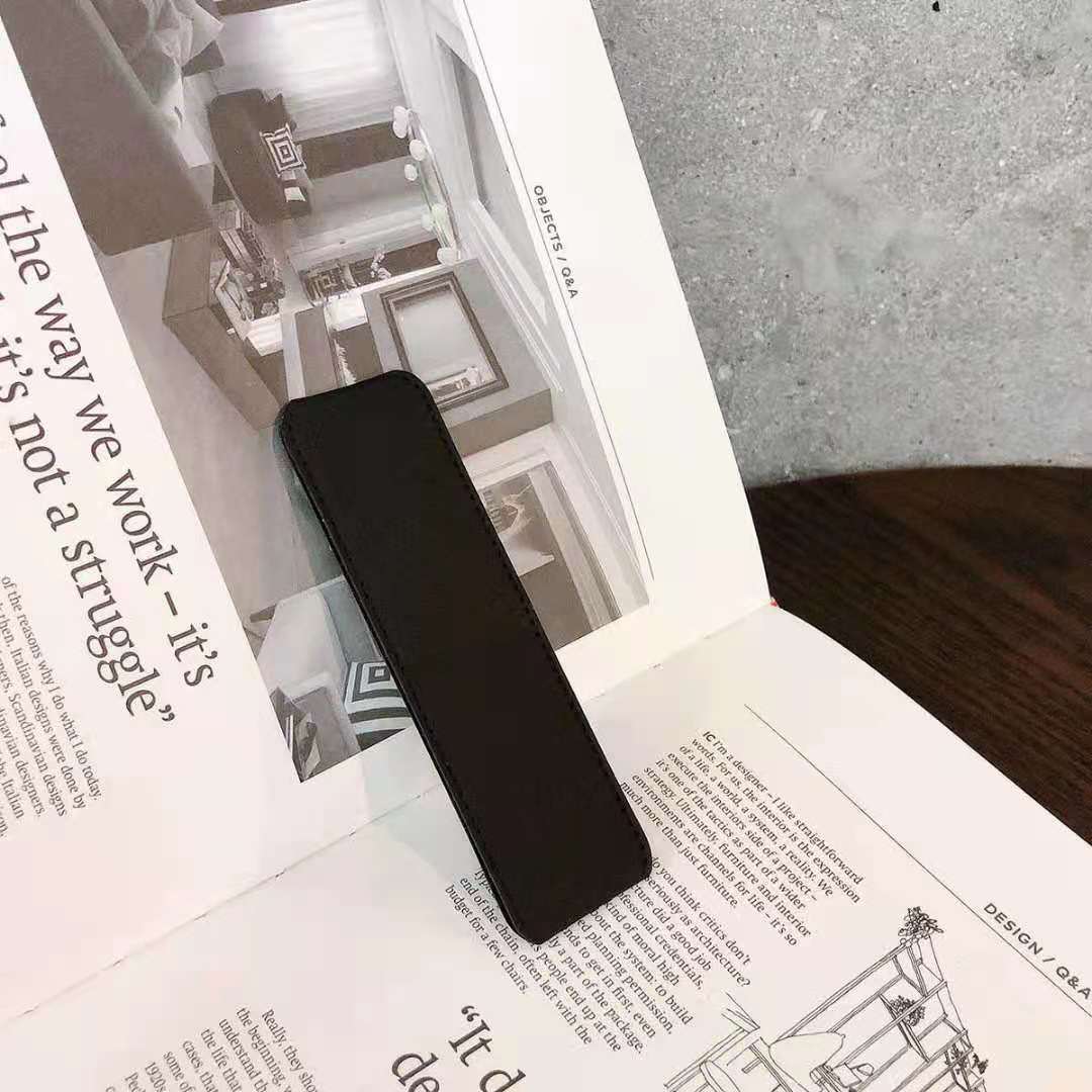 حامل هاتف محمول قابل للطي يعمل بنظام الدفع والسحب 