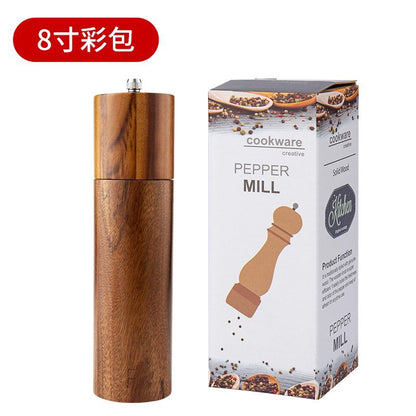 A lobular acacia cylindrical pepper grinder