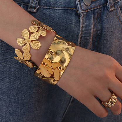 A European and American style titanium steel adjustable opening bracelet natural heavy industry beating pattern texture exaggerated personality design explosion