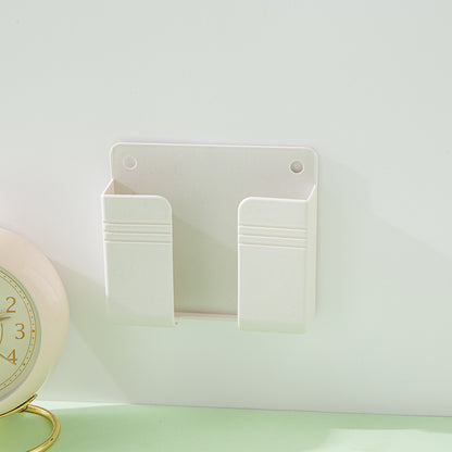 A wall-mounted mobile phone charging case storage rack