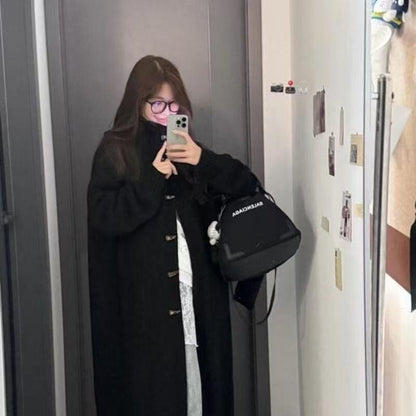 A long knit jacket